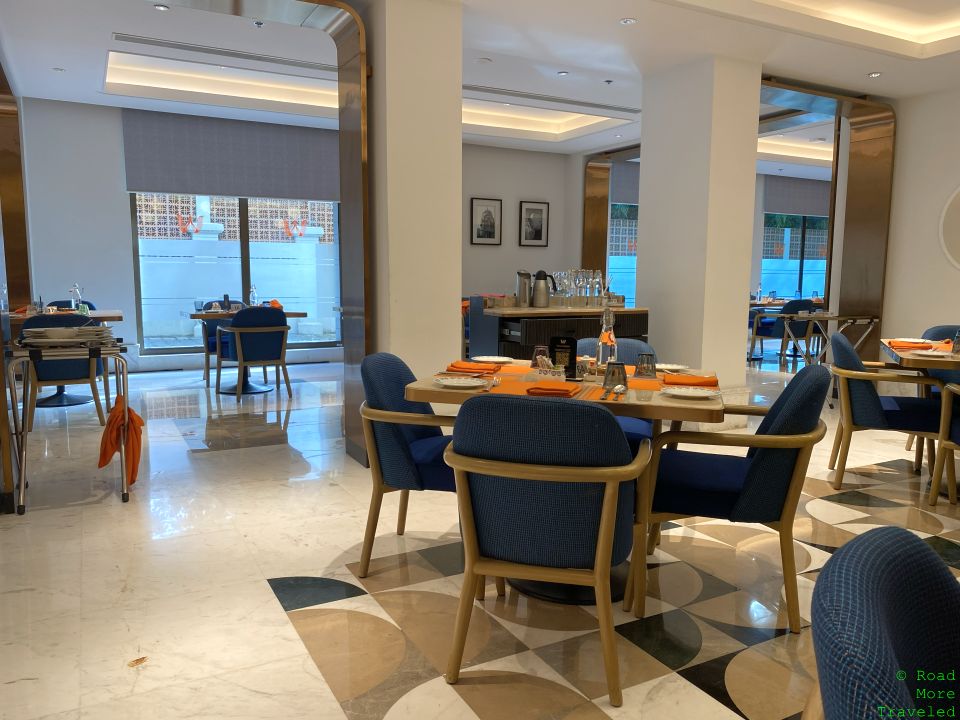 a room with a table and chairs