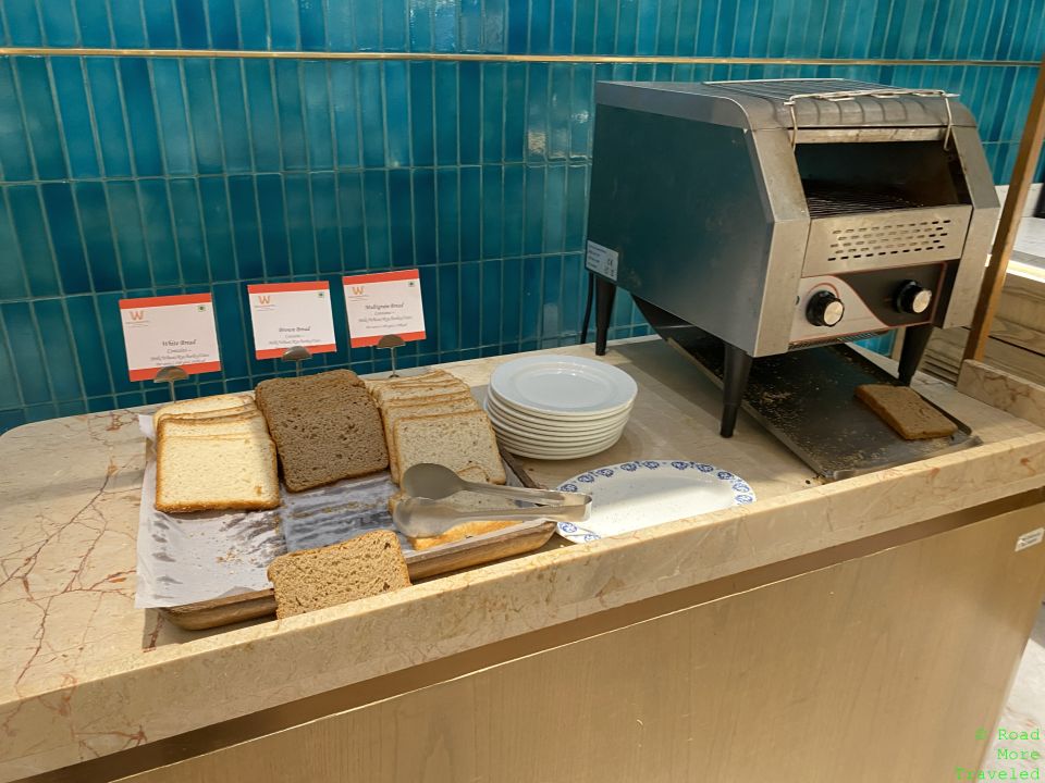 a toaster and bread on a counter