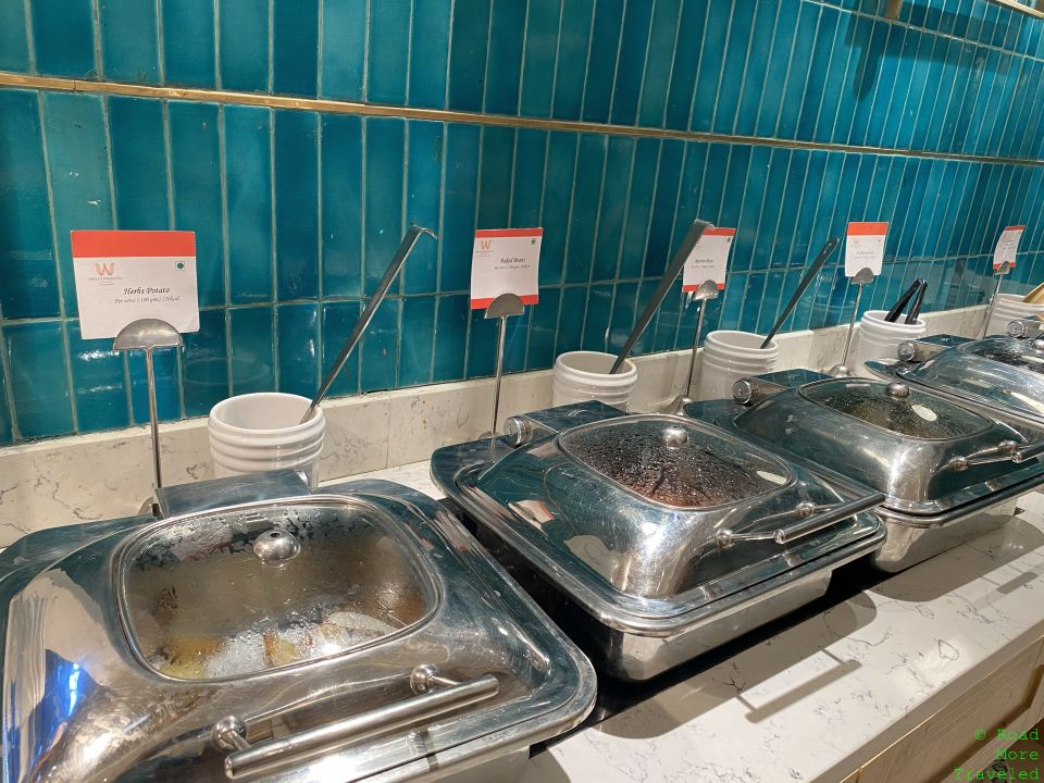 a row of food containers on a counter