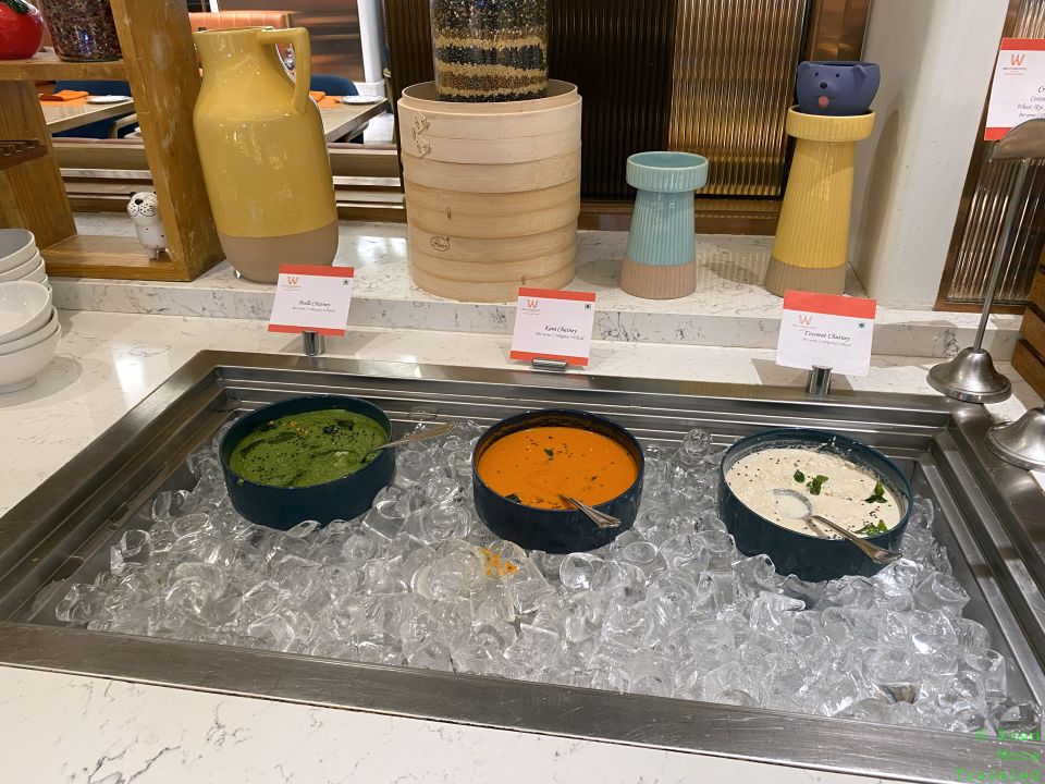 bowls of soups on ice in a restaurant