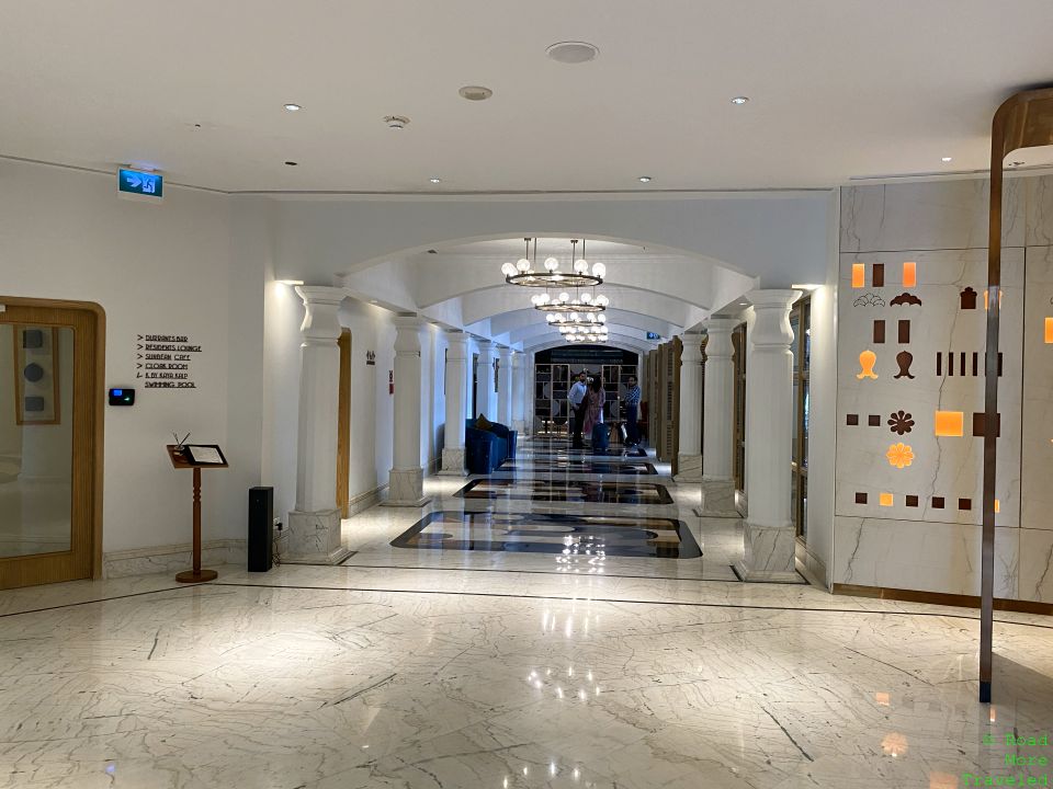 a hallway with marble floor and marble floor