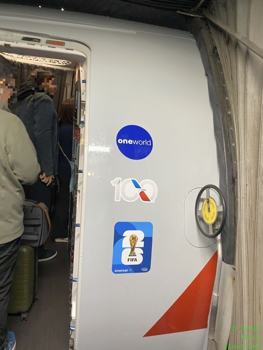 a door of an airplane with stickers