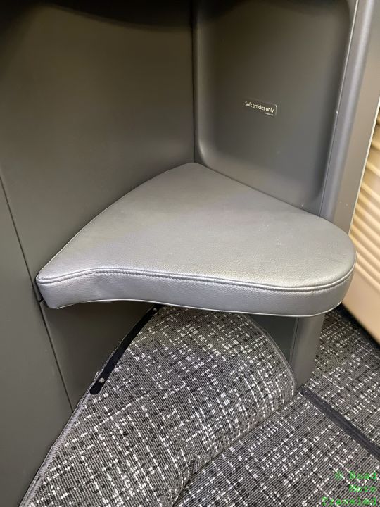 a grey chair with a grey seat