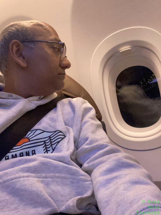 a man sitting in an airplane