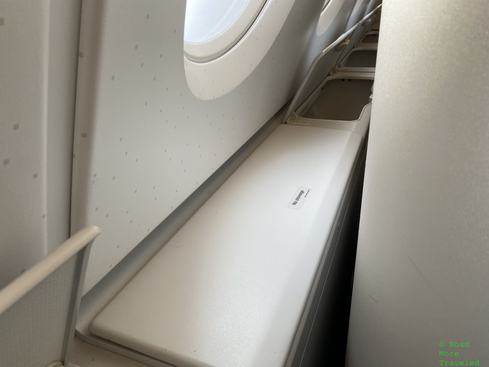 OZ Business Class second storage cubby